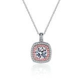 Moissanite necklace with pink accents on a white background